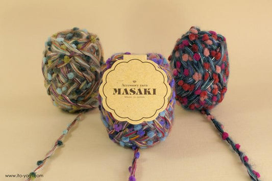 ITO MASAKI Tama multicolored nep yarn with big knobs - comp: 44% Nylon  18% Wool  16% Mohair  11% Silk  11% Silk